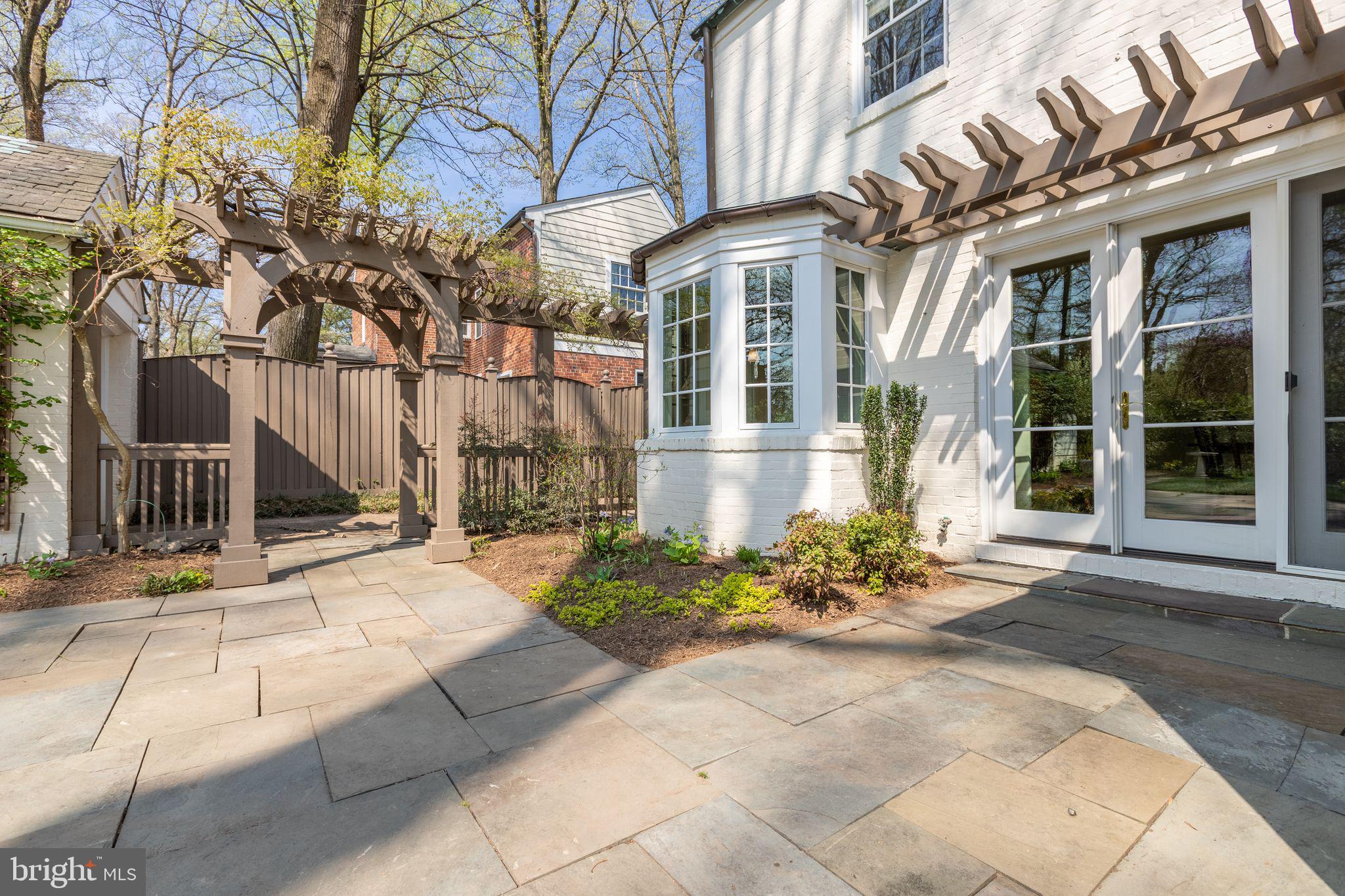 1306 Dale Drive Silver Spring, MD 20910 - Photo 26 of 33 Private patio with hydrangea, azaleas and wisteria