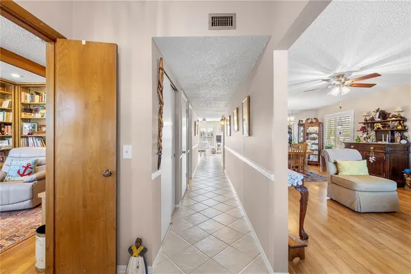 a view of a living room and entryway