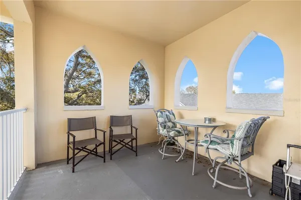 a view of a hallway with windows