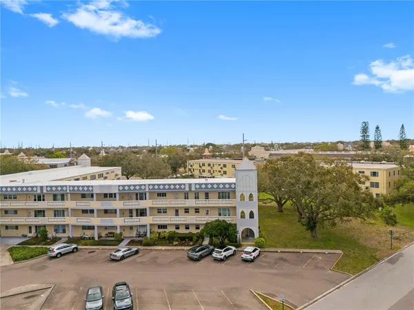 an aerial view of residential building and lake view