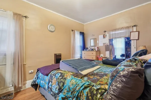 a room with furniture and wooden floor