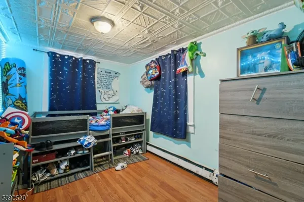 a kitchen with stainless steel appliances a white stove top oven and a refrigerator