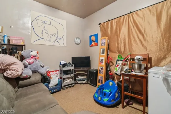 a room with toys and a wooden floor
