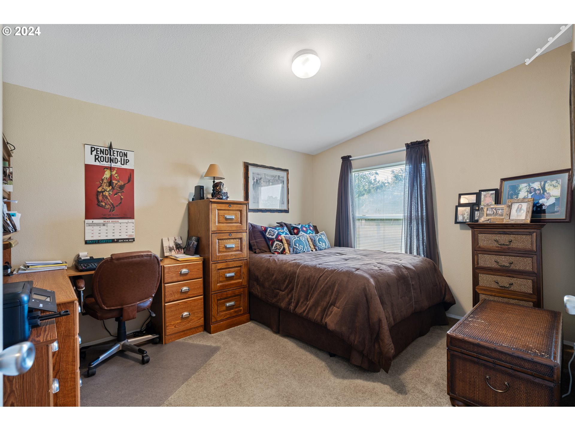 81385 North Golda Road Hermiston, OR 97838 - Photo 19 of 40 a bedroom with a bed and furniture