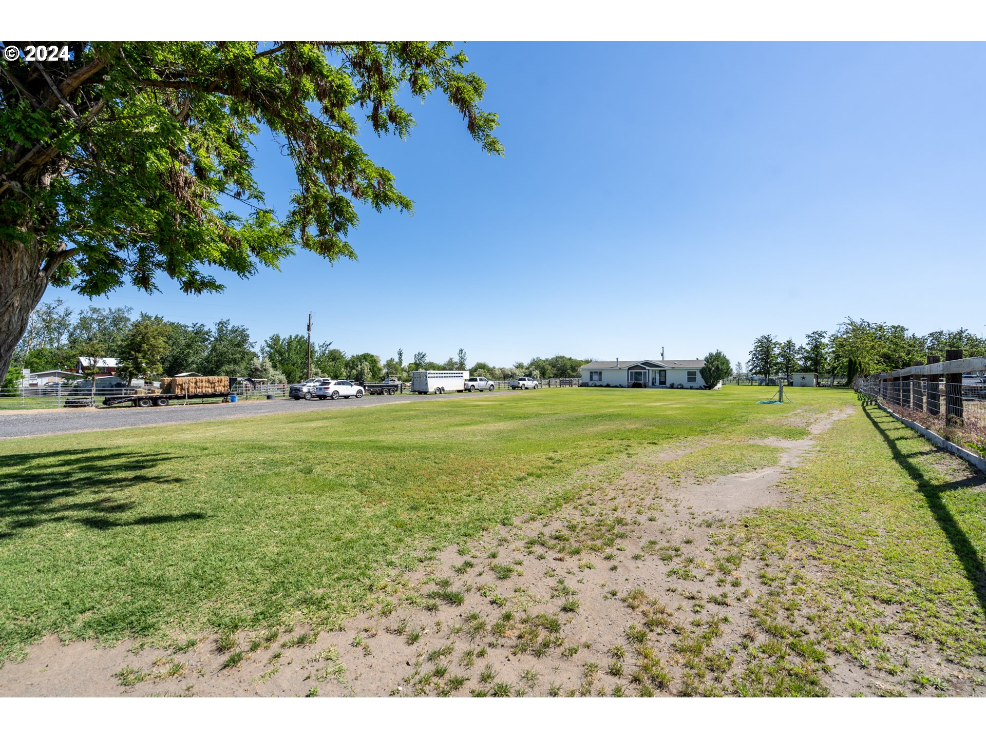 81385 North Golda Road Hermiston, OR 97838 - Photo 24 of 40 a view of an ocean house a yard and outdoor seating