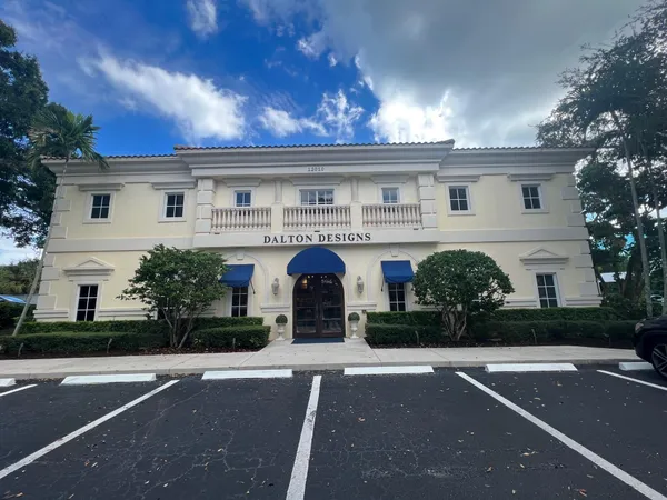front view of a house with a garden