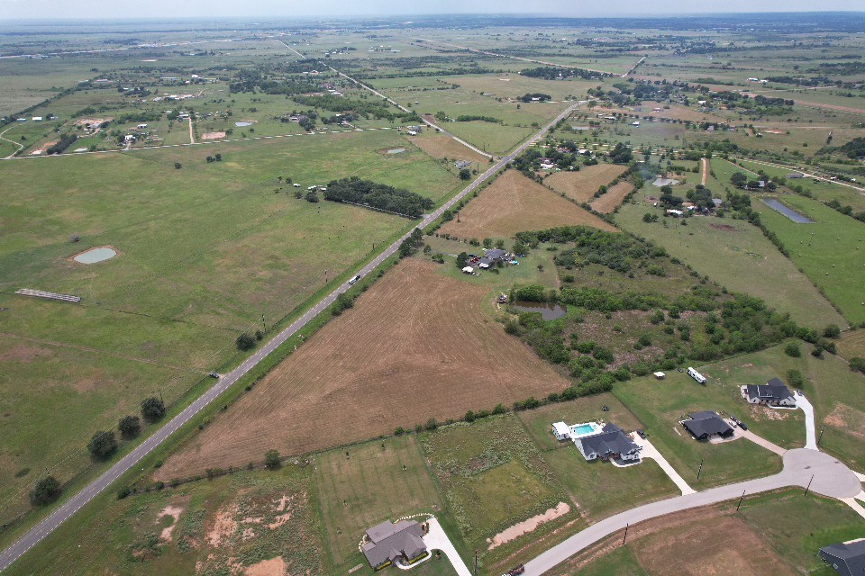 0 FM 2187 Road Sealy, TX 77474 - Photo 4 of 13 an aerial view of a house with a lake view