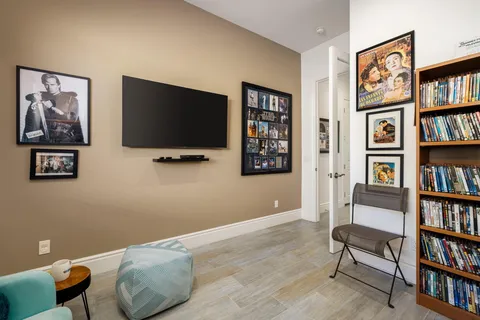 a view of a livingroom with a bookshelf