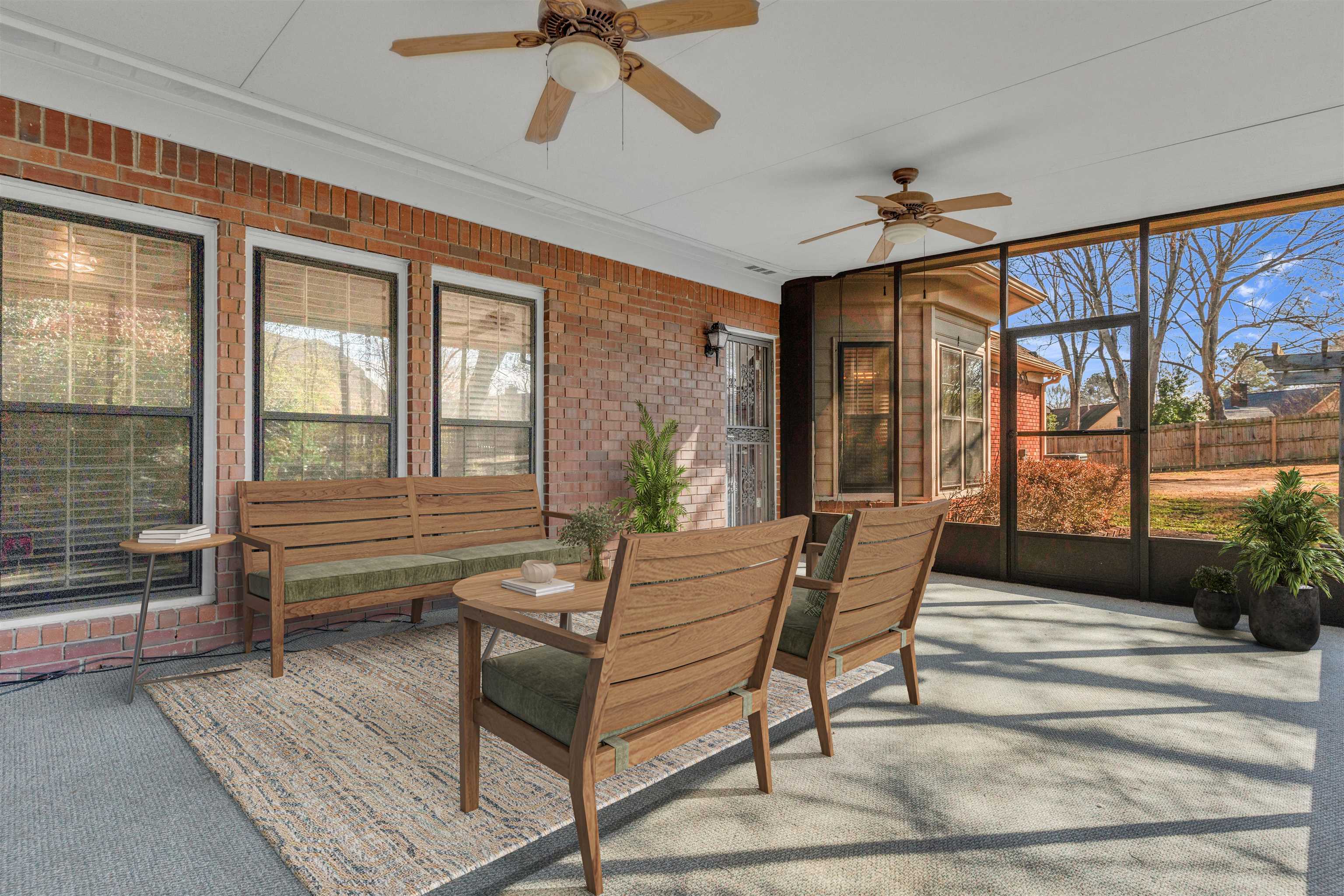 917 Valleyview Lane Collierville, TN 38017 - Photo 12 of 35 Sunroom with a ceiling fan. Virtually Staged