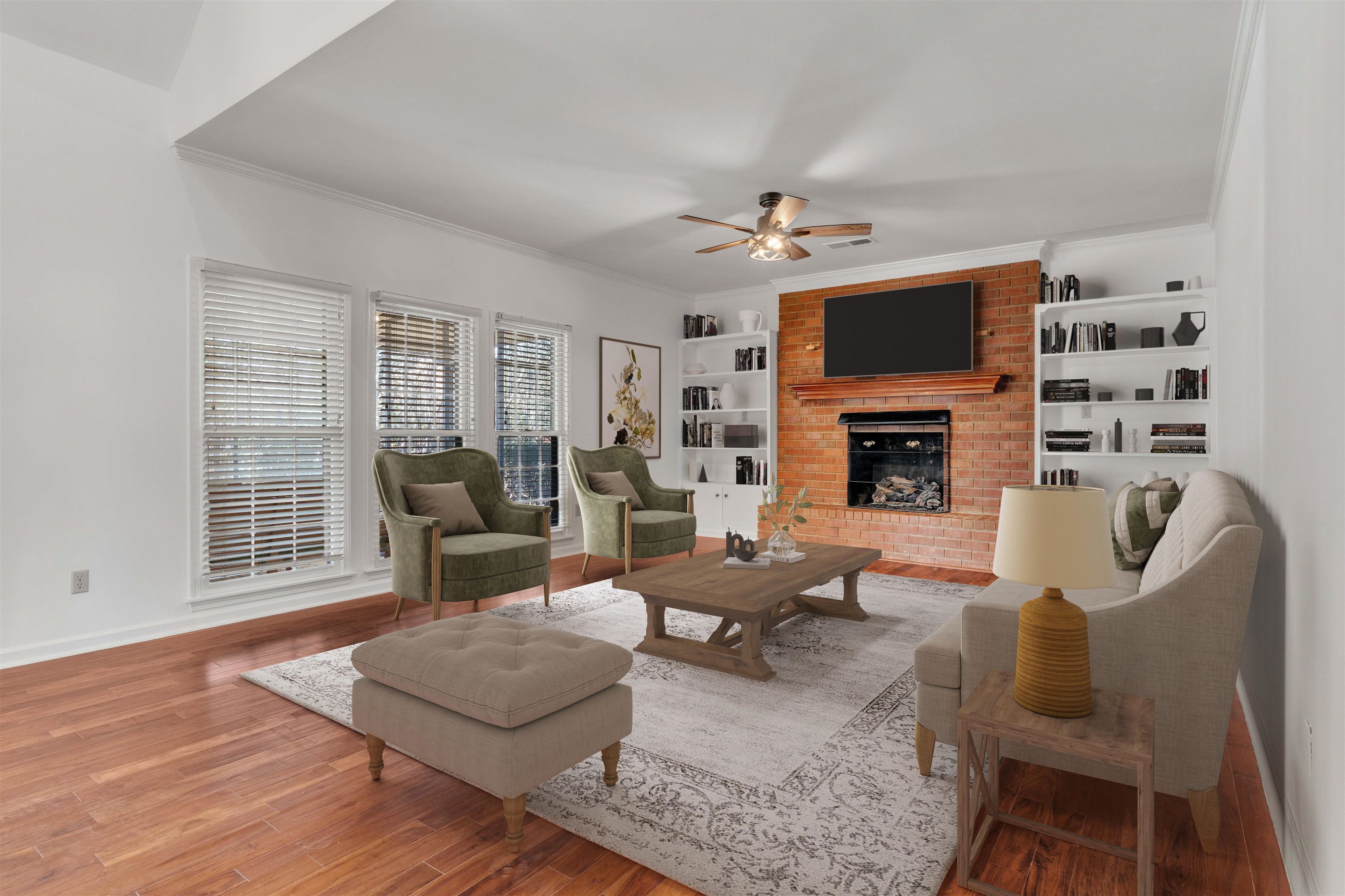 917 Valleyview Lane Collierville, TN 38017 - Photo 13 of 35 a living room with furniture a fireplace and a flat screen tv