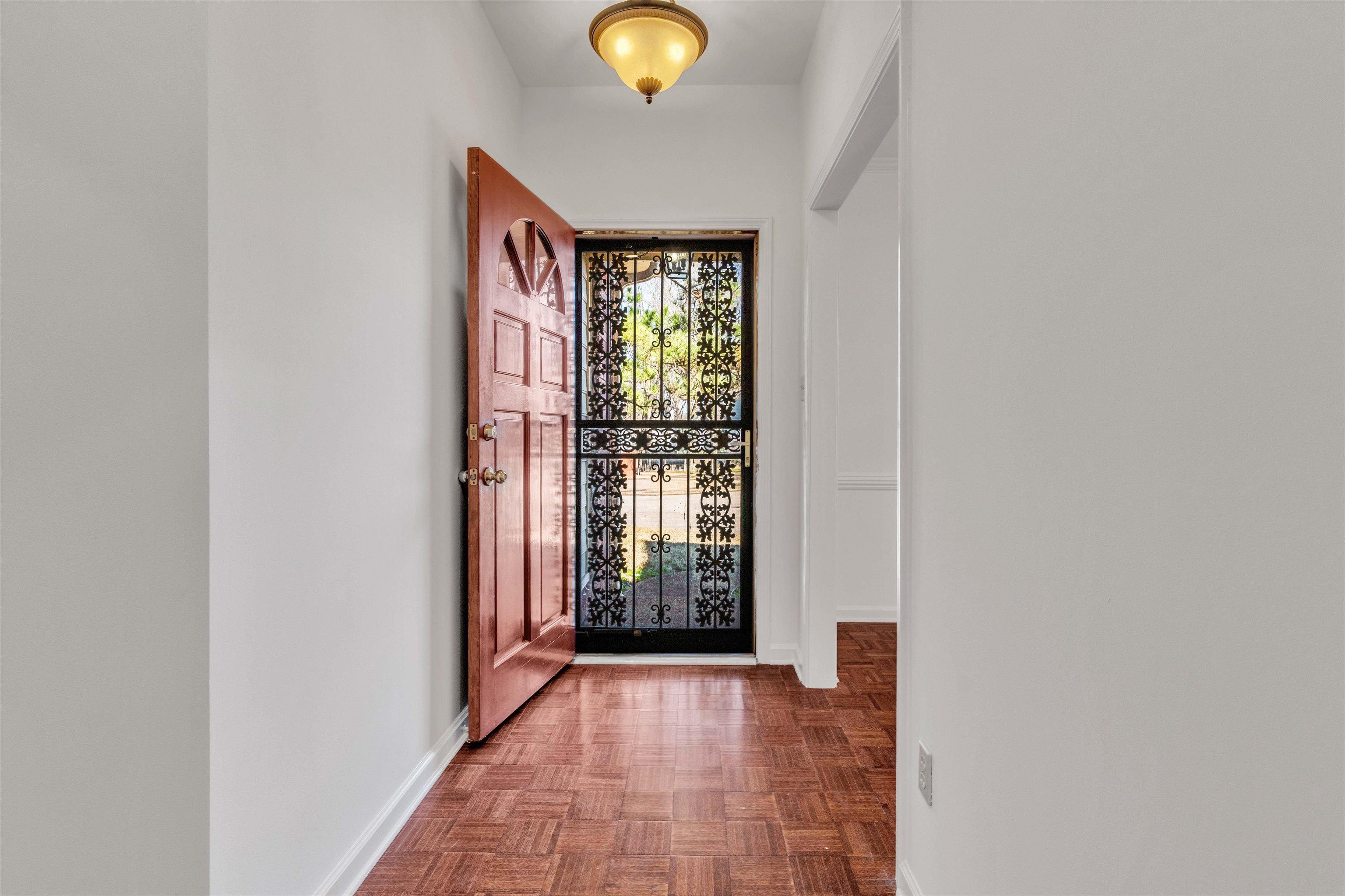 917 Valleyview Lane Collierville, TN 38017 - Photo 21 of 35 Entryway featuring baseboards and parquet flooring
