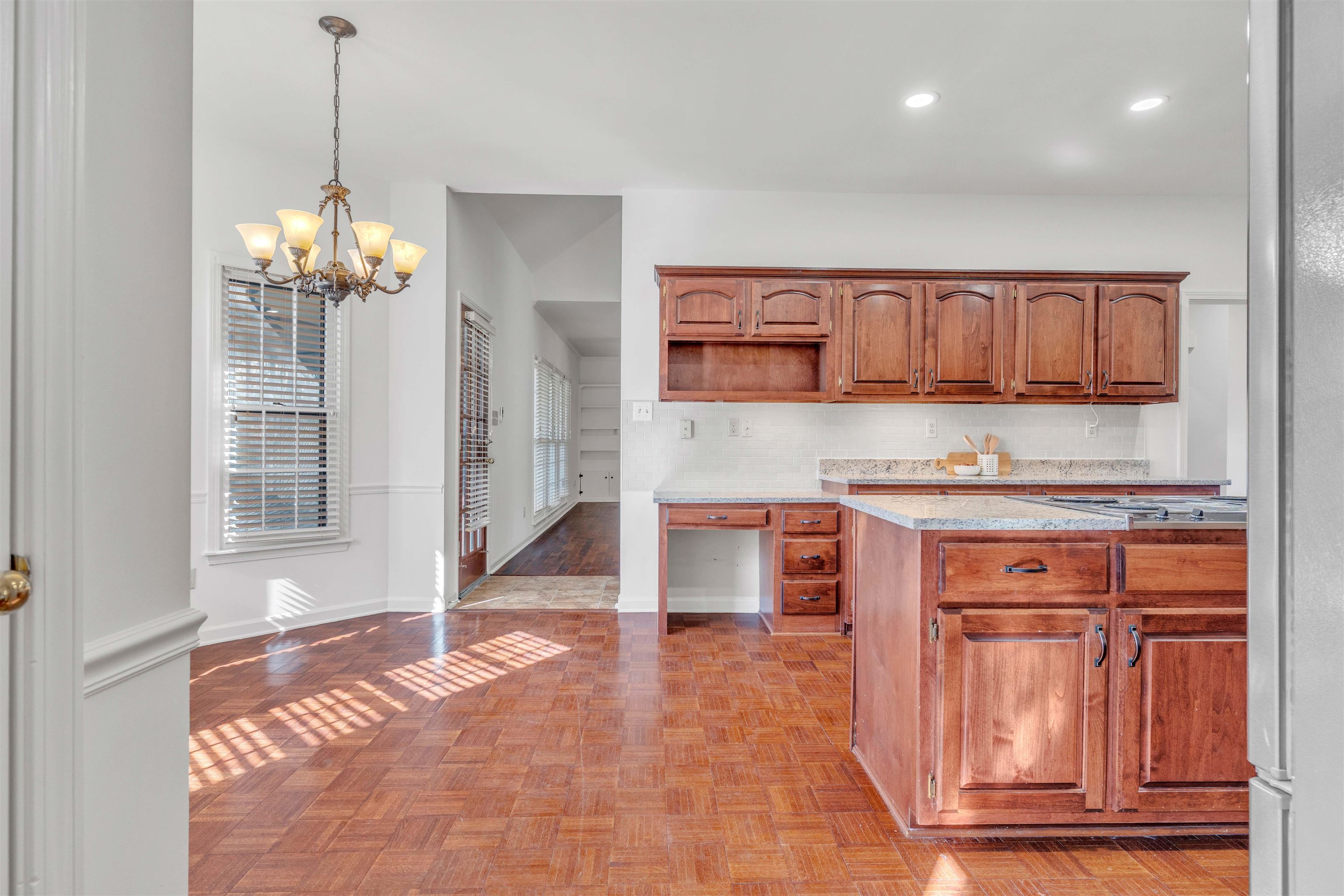 917 Valleyview Lane Collierville, TN 38017 - Photo 28 of 35 a kitchen with stainless steel appliances granite countertop a stove and a refrigerator