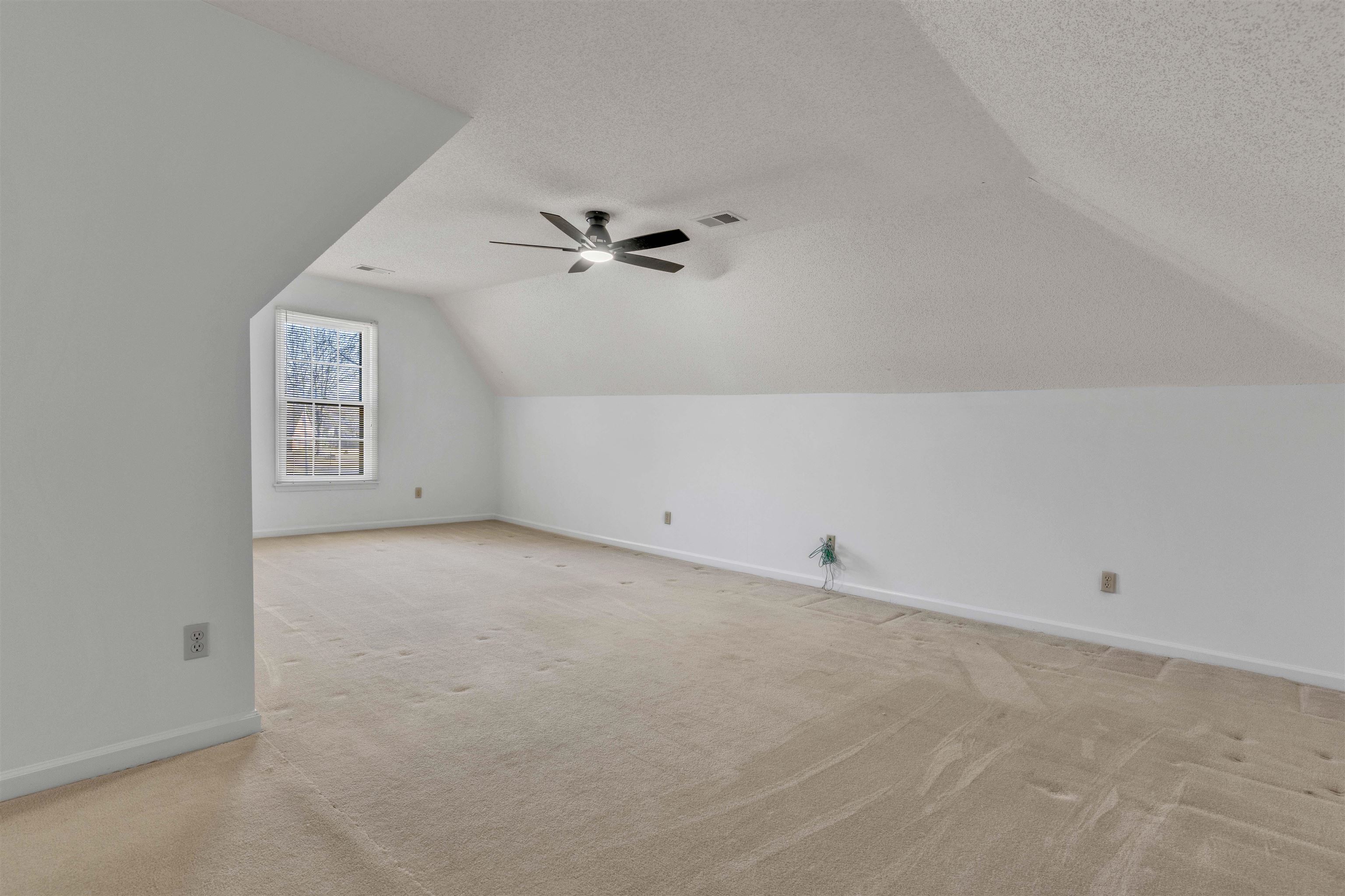 917 Valleyview Lane Collierville, TN 38017 - Photo 33 of 35 Bonus room with light carpet and a ceiling fan