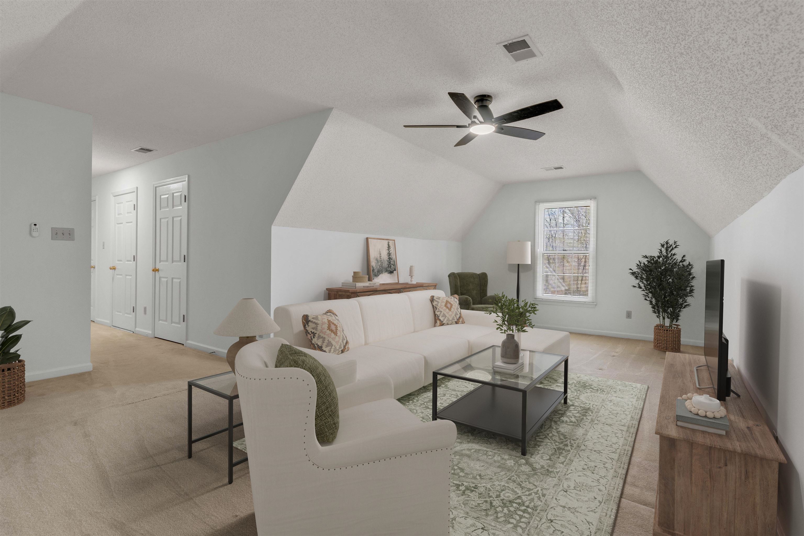 917 Valleyview Lane Collierville, TN 38017 - Photo 35 of 35 Living area with a textured ceiling and baseboards. Virtually Staged