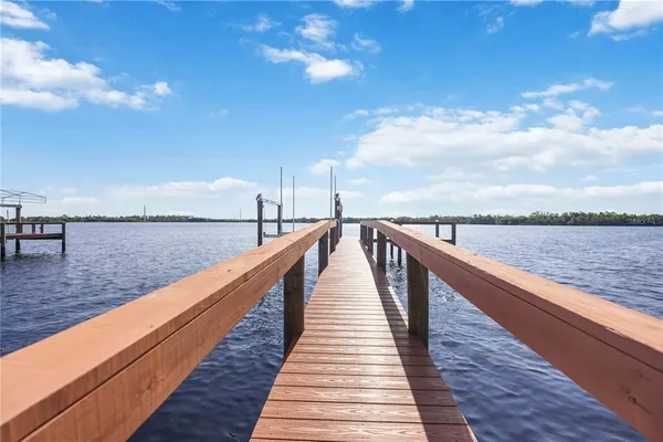 a view of wooden floor with a lake