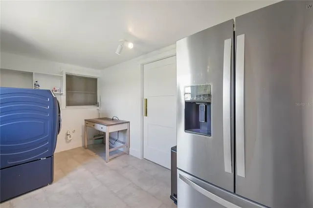 a view of swimming pool with furniture