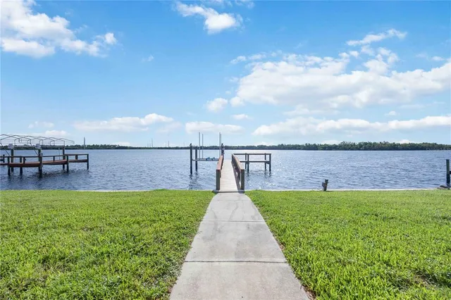 an aerial view of residential house with outdoor space and parking