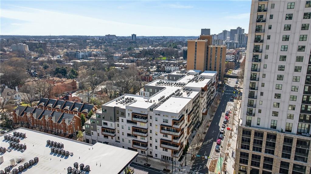 775 Juniper Street Northeast, Unit 413 Atlanta, GA 30308 - Photo 23 of 47 a view of a city with tall buildings
