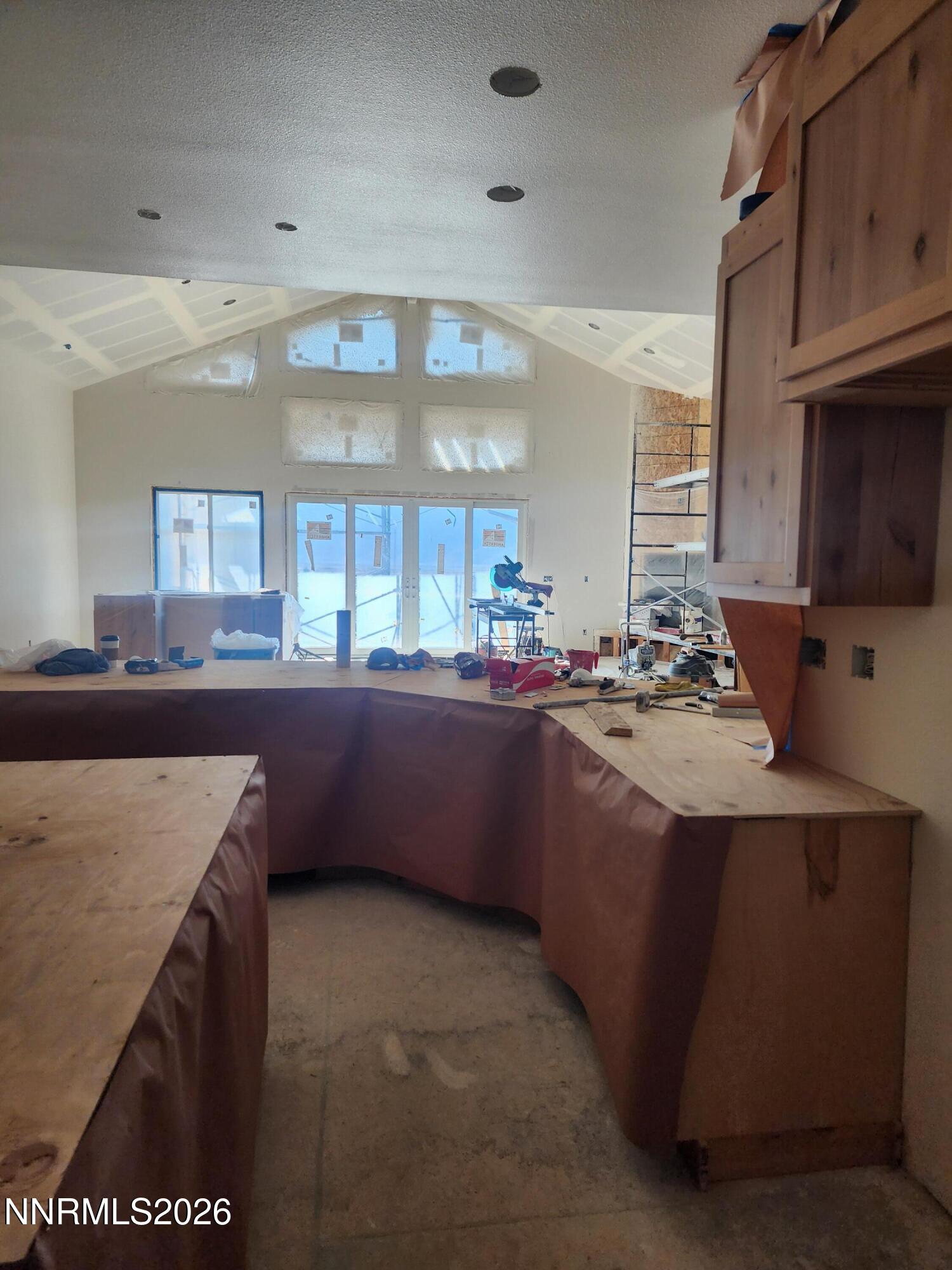 2037 East Valley Road Minden, NV 89423 - Photo 16 of 32 a kitchen with stainless steel appliances granite countertop a sink and cabinets