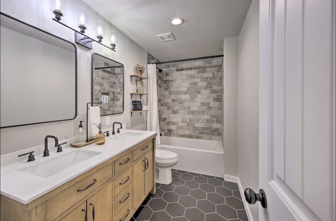 10630 River Ranch Road Kemp, TX 75143 - Photo 25 of 36 a bathroom with a double vanity sink mirror double and toilet
