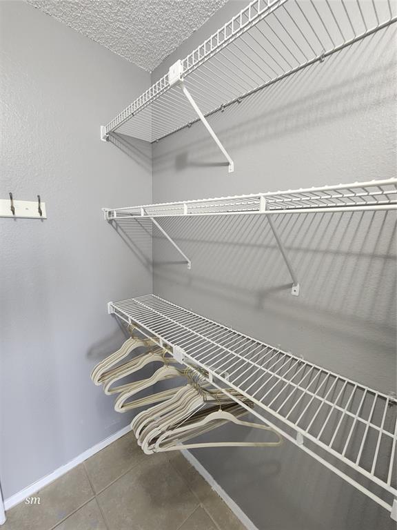 2866 South University Drive, Unit 5308 Davie, FL 33328 - Photo 11 of 26 a view of a room with racks on the wall