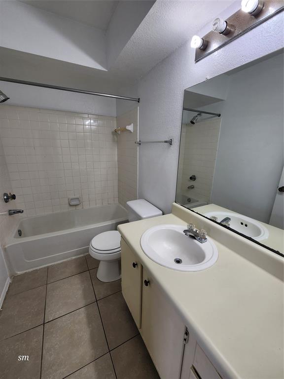 2866 South University Drive, Unit 5308 Davie, FL 33328 - Photo 15 of 26 a bathroom with a sink a toilet and shower