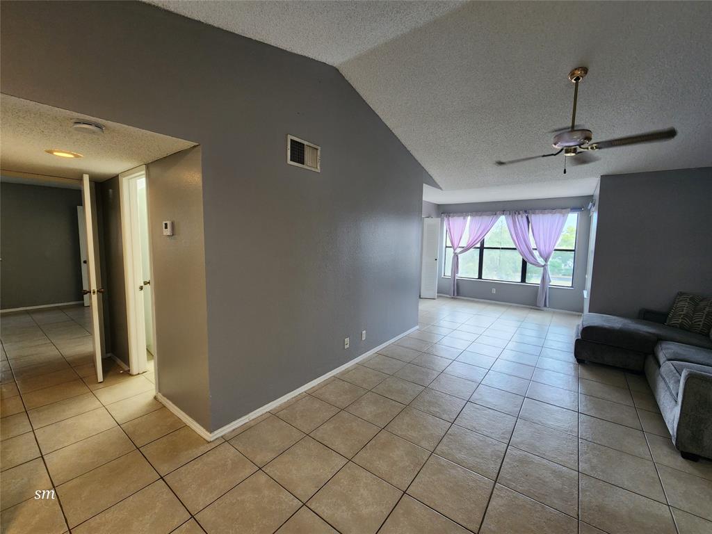 2866 South University Drive, Unit 5308 Davie, FL 33328 - Photo 16 of 26 a view of an empty room and window