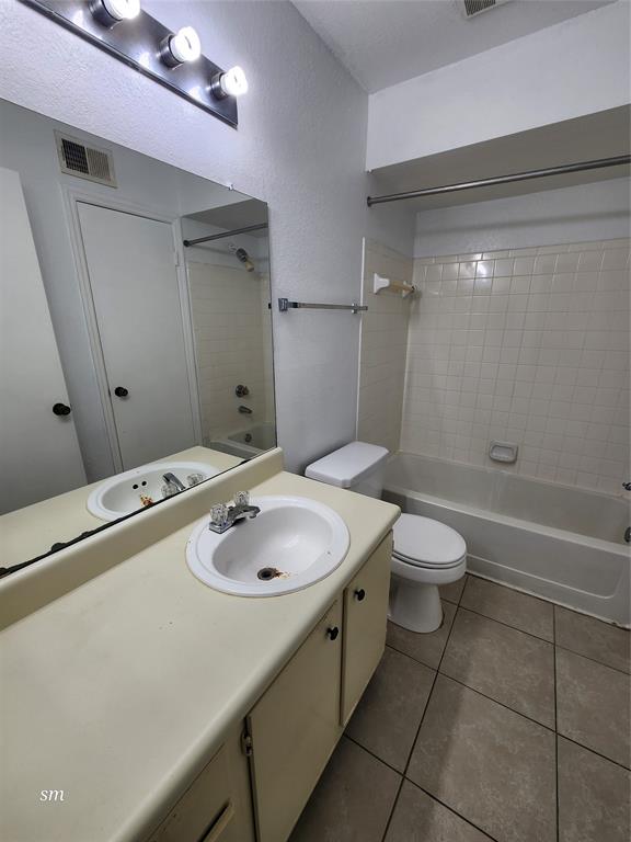 2866 South University Drive, Unit 5308 Davie, FL 33328 - Photo 21 of 26 a bathroom with a sink a toilet and shower