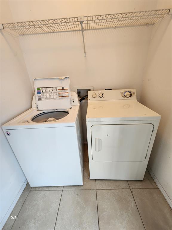 2866 South University Drive, Unit 5308 Davie, FL 33328 - Photo 9 of 26 a utility room with dryer and washer