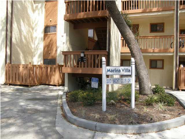 a view of a house with entrance gate