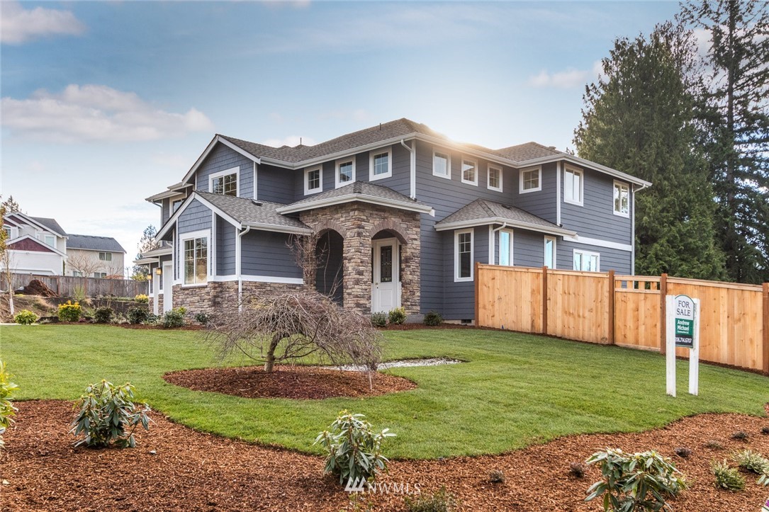 6505 Southeast 2nd Place Renton, WA 98059 - Photo 2 of 25 a front view of a house with a yard