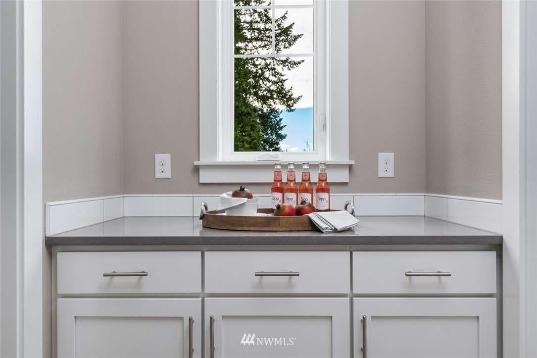 6505 Southeast 2nd Place Renton, WA 98059 - Photo 15 of 25 a bathroom with a sink and a mirror