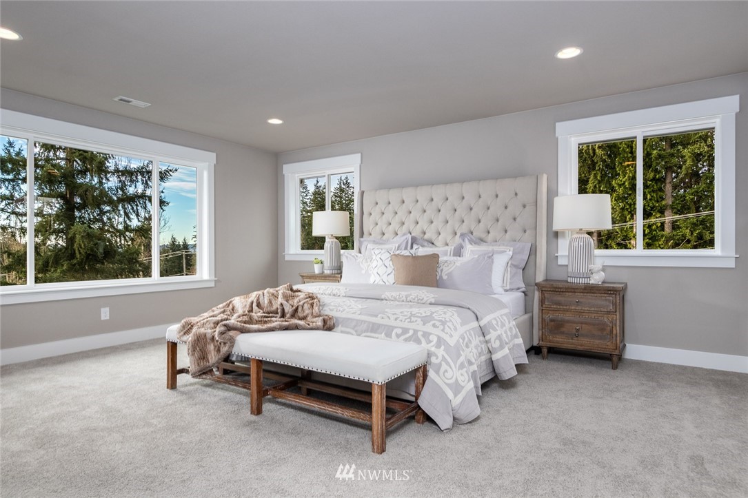 6505 Southeast 2nd Place Renton, WA 98059 - Photo 20 of 25 a bedroom with bed and wooden floor