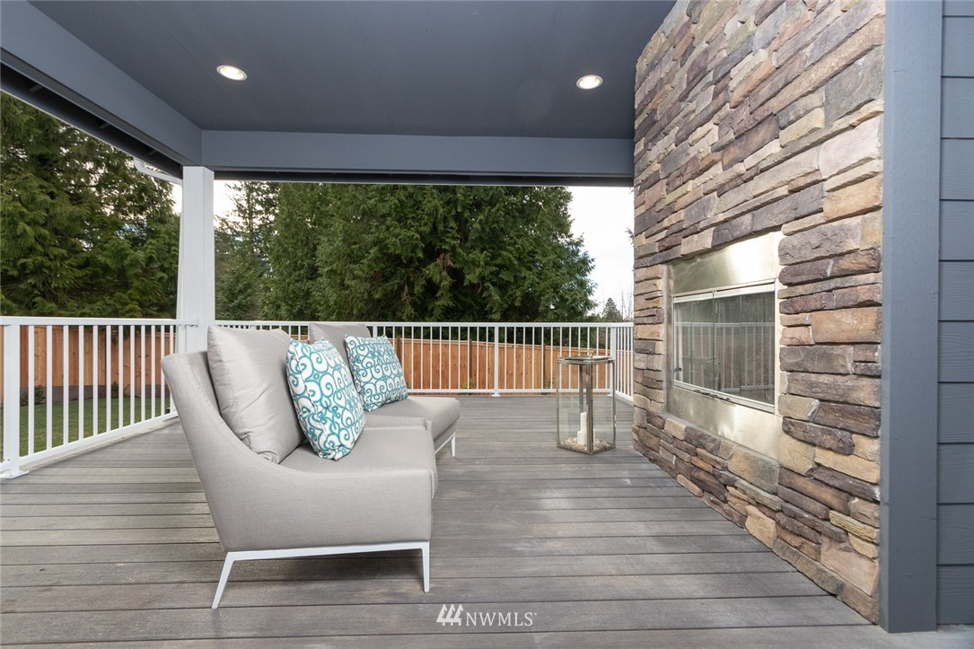 6505 Southeast 2nd Place Renton, WA 98059 - Photo 22 of 25 a view of a chair and table in the balcony
