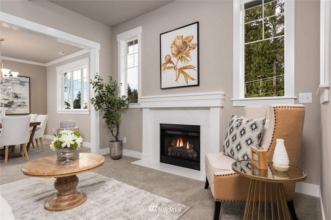6505 Southeast 2nd Place Renton, WA 98059 - Photo 5 of 25 a living room with furniture and a fireplace