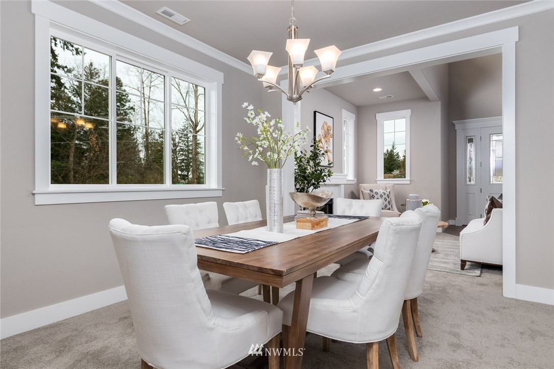 6505 Southeast 2nd Place Renton, WA 98059 - Photo 7 of 25 a view of a dining room with furniture window and outside view