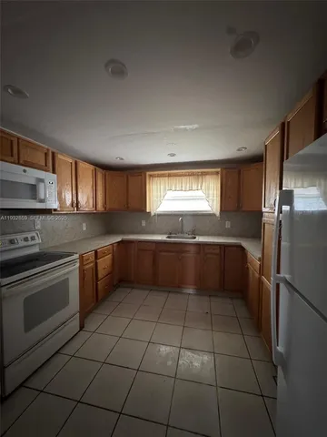 $489,000 | 1040 Curtiss Drive, Opa-Locka, FL 33054