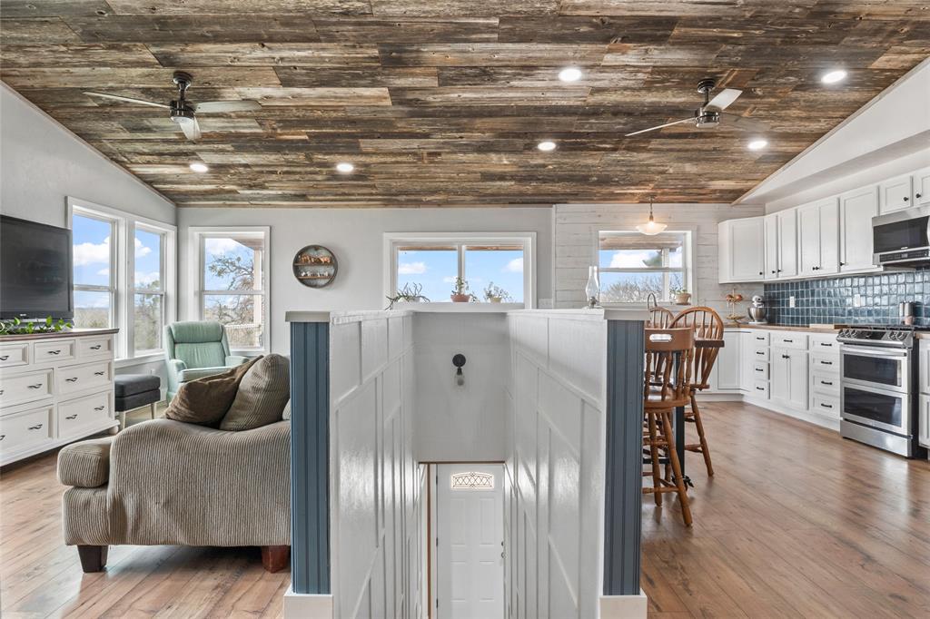 7949 North Fm 373 Road Muenster, TX 76252 - Photo 20 of 38 a living room with furniture and a flat screen tv