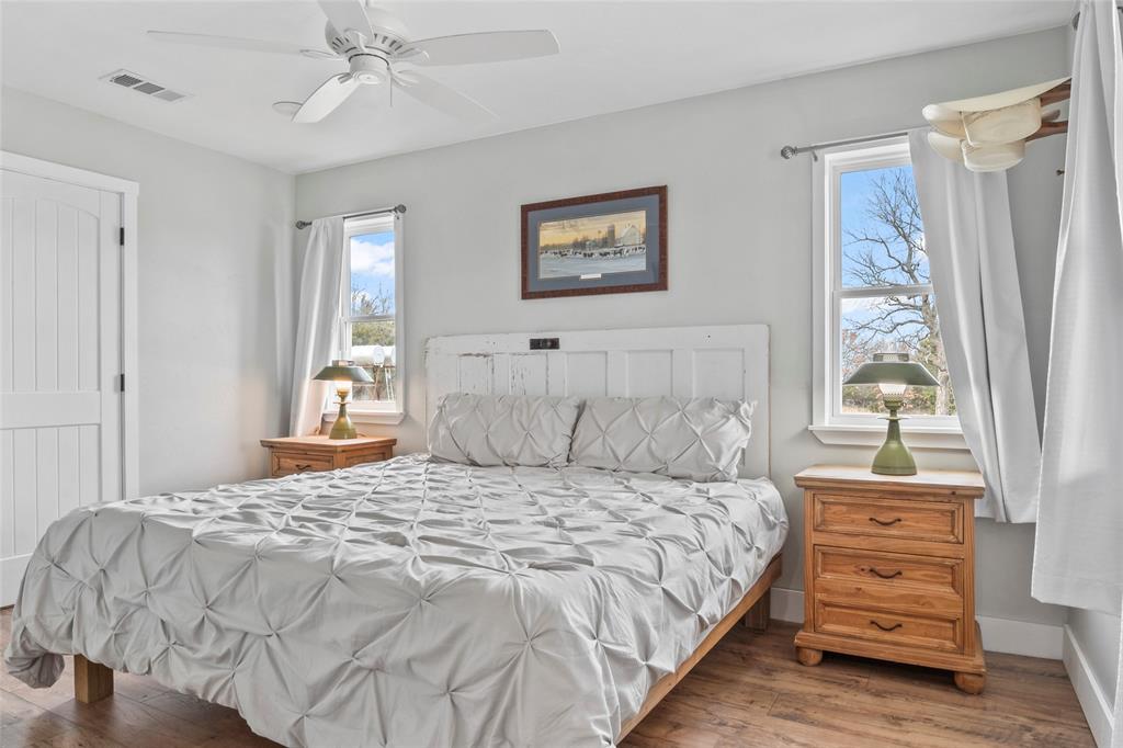 7949 North Fm 373 Road Muenster, TX 76252 - Photo 27 of 38 a bedroom with a bed and a window