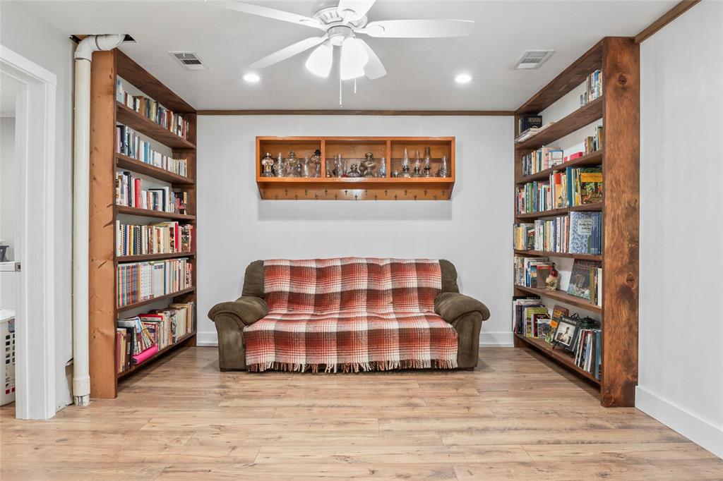 7949 North Fm 373 Road Muenster, TX 76252 - Photo 30 of 38 a view of a room with window and wooden floor