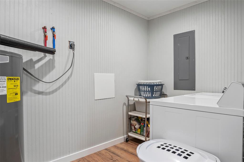 7949 North Fm 373 Road Muenster, TX 76252 - Photo 36 of 38 a utility room with dryer and washer