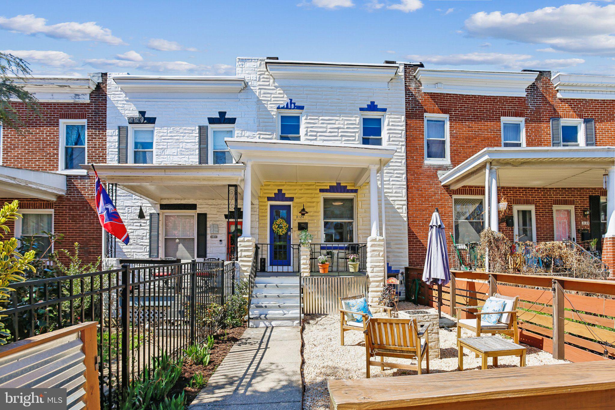 3124 Chestnut Avenue Baltimore, MD 21211 - Photo 2 of 25 Charming row homes with vibrant facades.