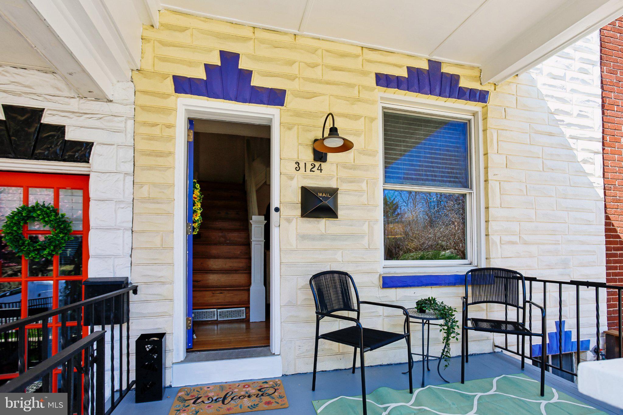 3124 Chestnut Avenue Baltimore, MD 21211 - Photo 3 of 25 Charming entryway with vibrant accents.