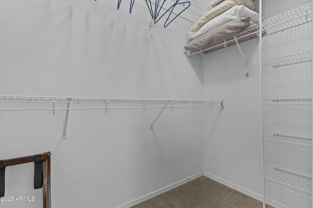 a view of a room with racks on the wall