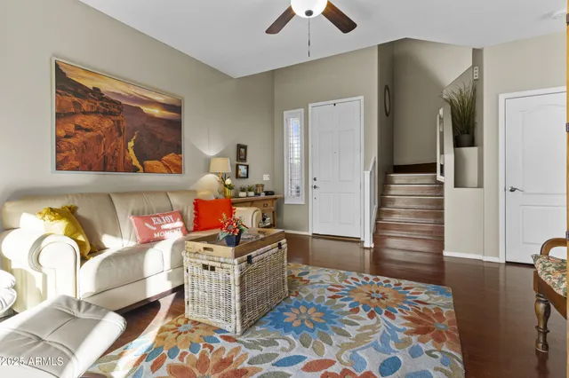 a bedroom with furniture and a lamp