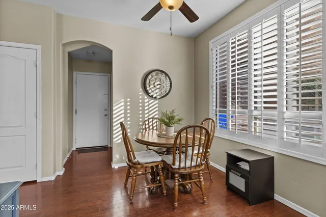 a view of a room with furniture and window