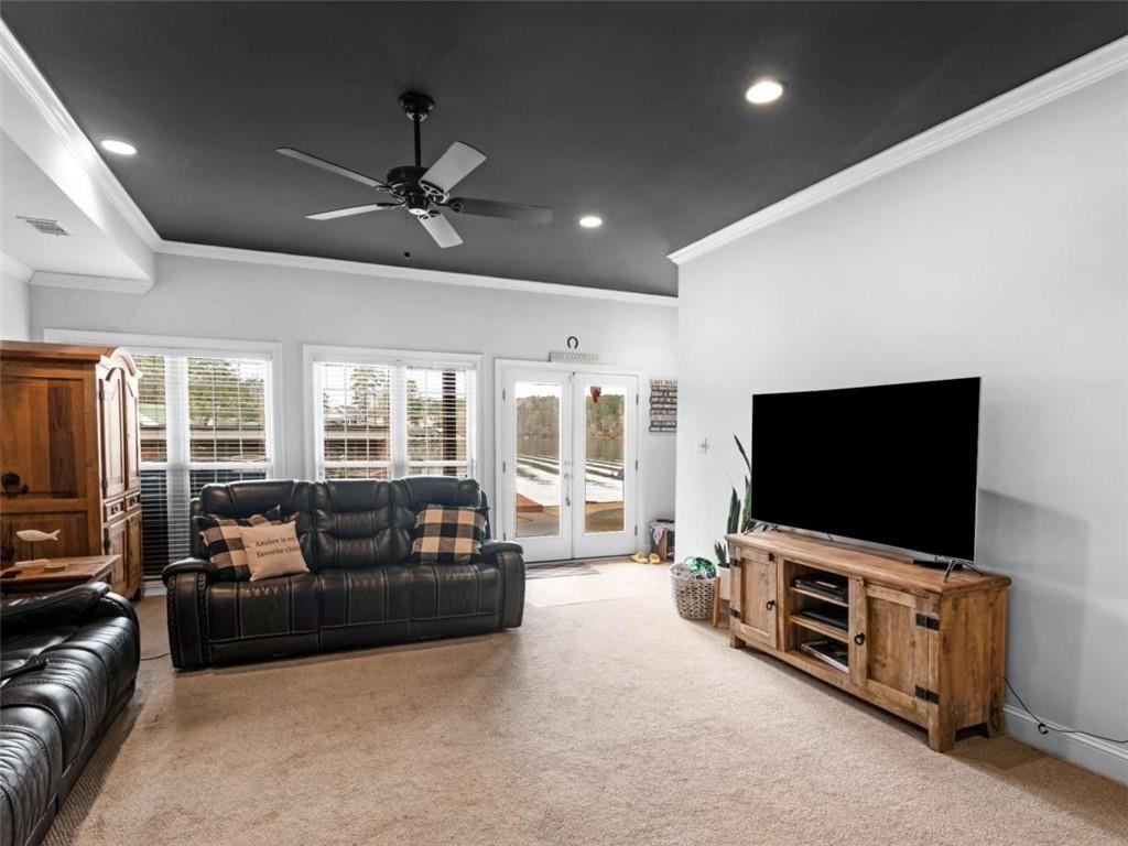 157 Andrea Circle Jackson, GA 30233 - Photo 13 of 19 a living room with furniture and a flat screen tv