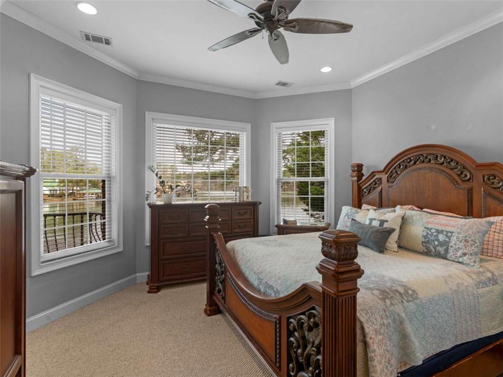 157 Andrea Circle Jackson, GA 30233 - Photo 6 of 19 a bedroom with a bed and a large window