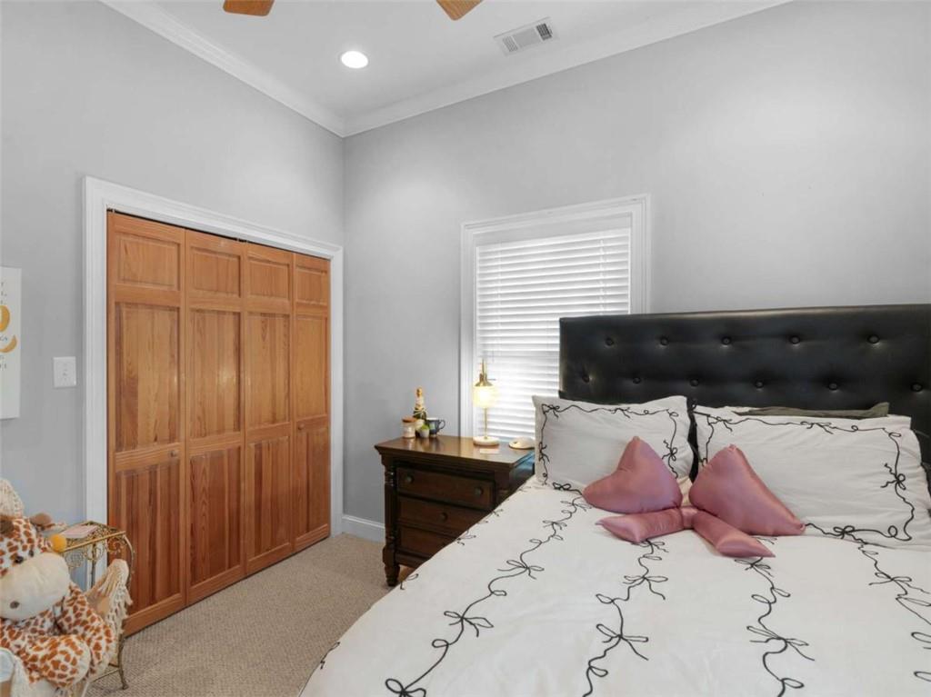 157 Andrea Circle Jackson, GA 30233 - Photo 9 of 19 a bedroom with a bed and a window