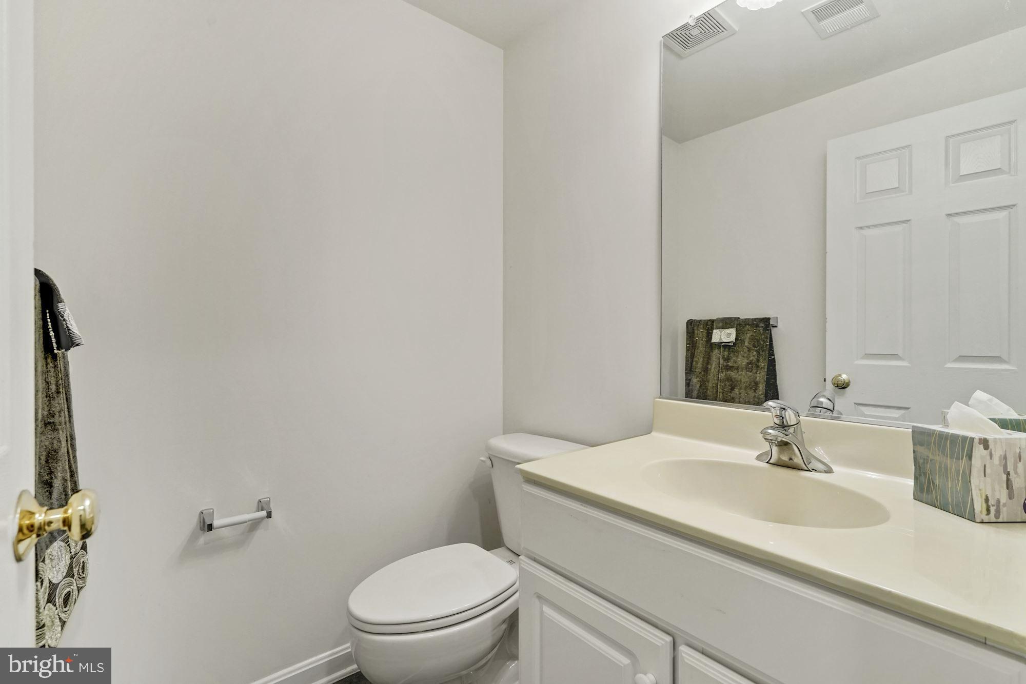 11504 Clairmont View Way Silver Spring, MD 20902 - Photo 8 of 33 Main level half bath
